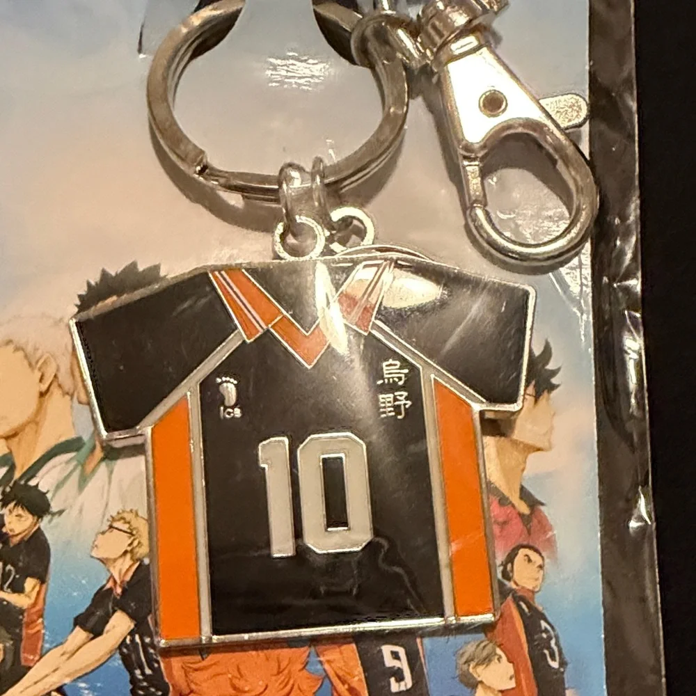 Haiku Black and Orange Volleyball Jersey Keychain with Number 10